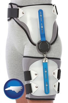 an orthopedic hip brace - with North Carolina icon